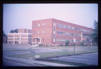 Brick building. Color photo. April 1973. 